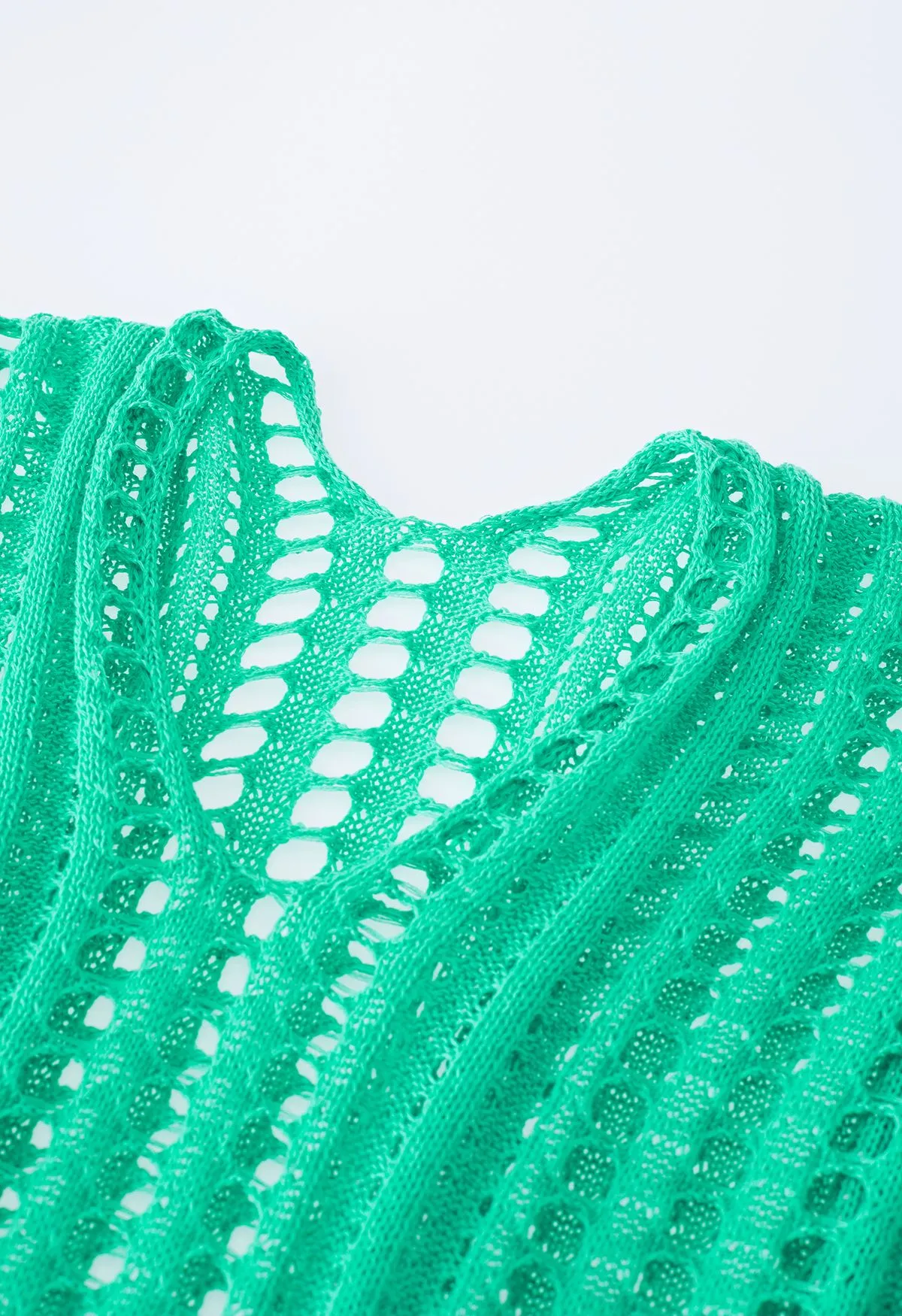 Couverture en tricot ajouré à fentes latérales en vert