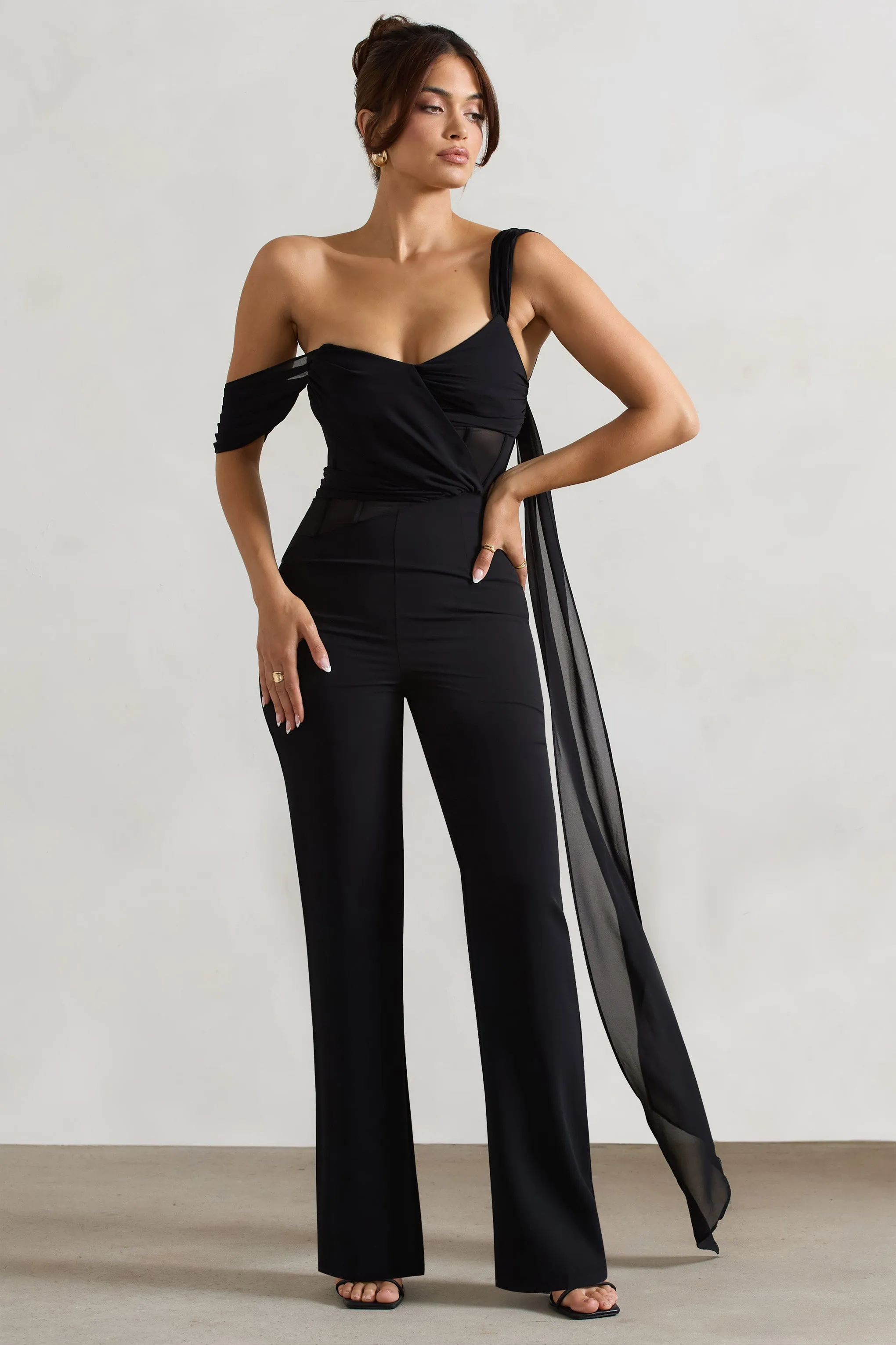 Fatale | Combinaison noire à manches drapées et corsetée avec ruban en chiffon